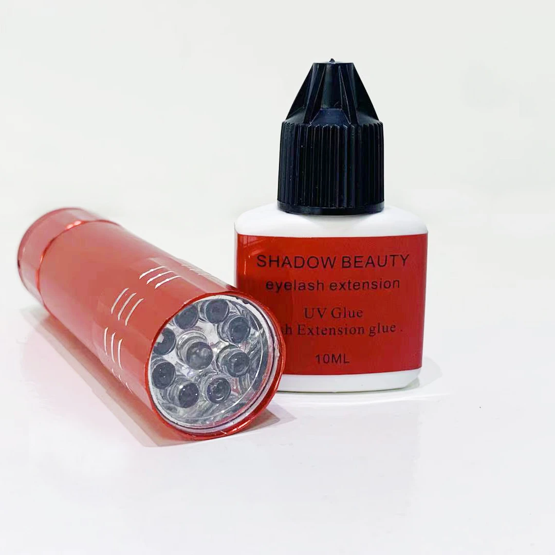

uv lash glue set consist of 10 ml uv led eyelash extension glue and uv lamp for lashes