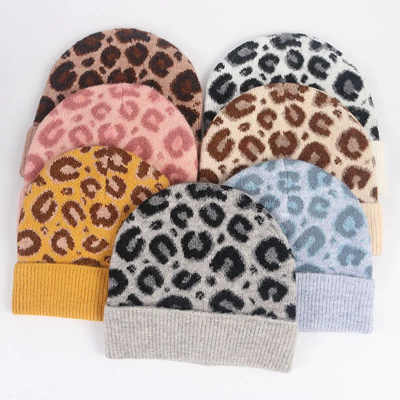 

Wholesale hot sale new Soft and warm Winter hat Leopard Print knitted hats Pom Pom Beanie cap, Mix colors