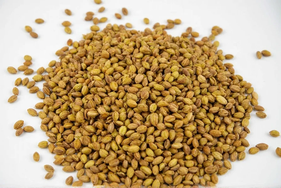 Spice market vendor holding cardamom pods