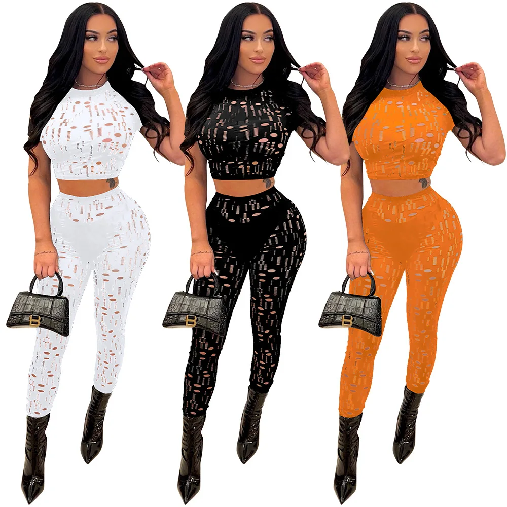 

2022 M03871 - casual solid color short sleeve t shirt and pants hole women 2 piece set