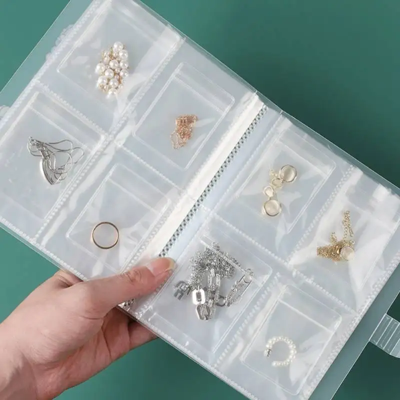 

Wholesale Fashion Multi Size Travel Portable Water Proof Transparent Plastic PVC Jewelry Storage Organizer Book, As picture