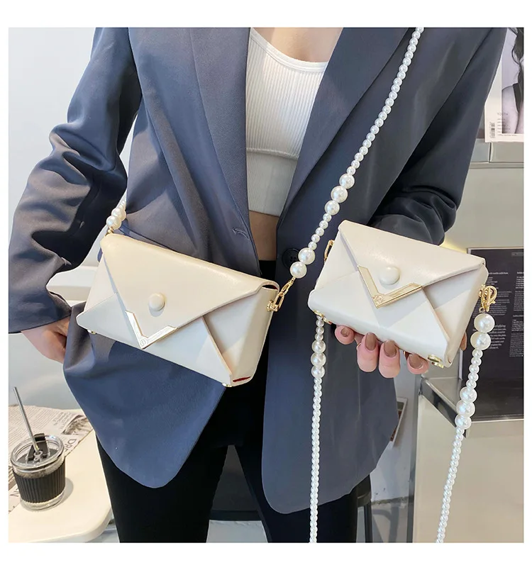 

2021 latest fashion woman pearl bag 2021 luxury flap handbags for ladies
