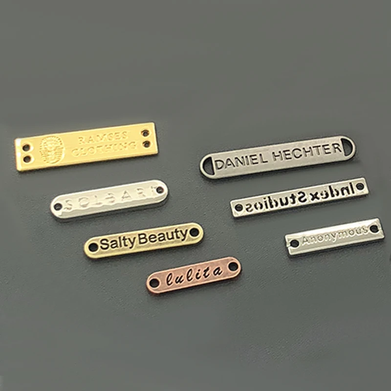 

Factory Direct Sale Cheap Neck Label Can Be Customized Logo Metal Clothing And Bag Name metal Tags