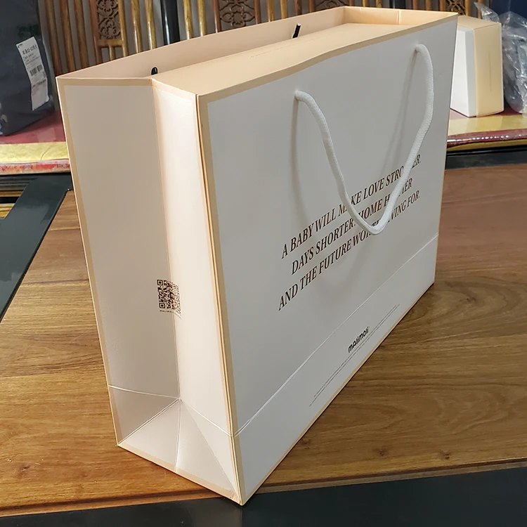 
Custom Personalized Present Carrier Wrapping White Kraft Paper Gift Bag With Twisted Handles 