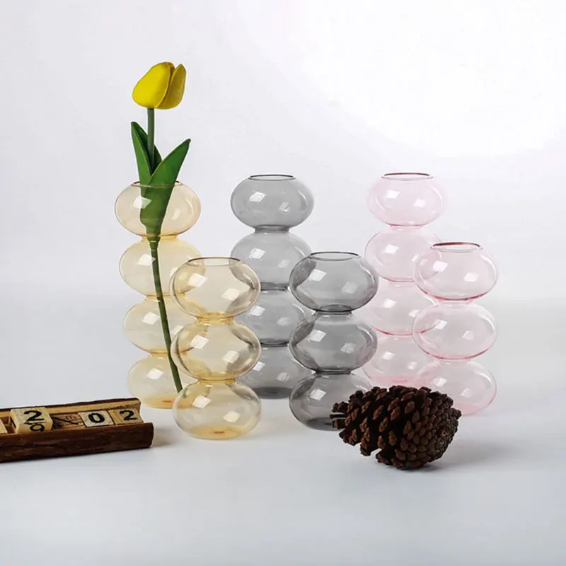 

Redeco Amazon Colored Shaped Vase Colored Glass Bubble Vase Transparent Table Vases For Home Decoration, Picture
