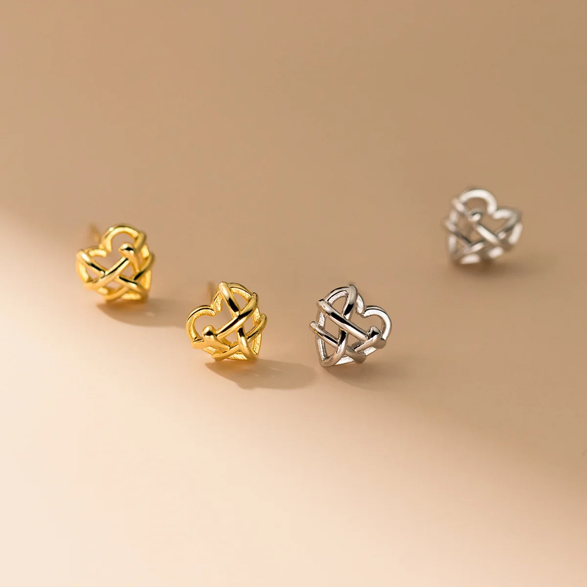 Europe and America Fashion Jewelry 925 Sterling Silver Braid Hollow Out Heart Gold Plated Stud Earring Jewelry for Women