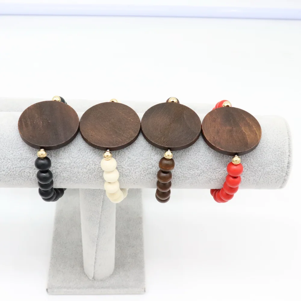 

Cheap Laser Engraved Wooden Beaded and Disc Wholesale Elastic Handmade Bracelet