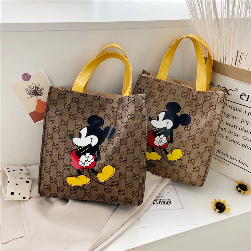 

New Mickey mouse canvas cartoon printed handbag korean women hand bag comestic bag mobile phone bag wholesale custom, Picture