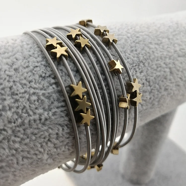 

Amor Leisure Stainless Steel 316 Gray Star Beads Guitar String Spring Bracelets Bangle Jewelry
