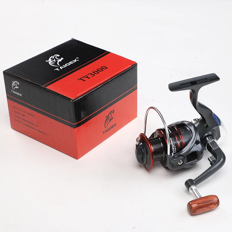 

TAIGEK Factory price Cheap 3000 series spinning penn Fishing reel 13+1BB 5.2:1 fly jigging fishing pesca reels