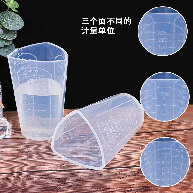 

Drop mold high penetration triangle measuring cup tool different measuring units on three sides, White