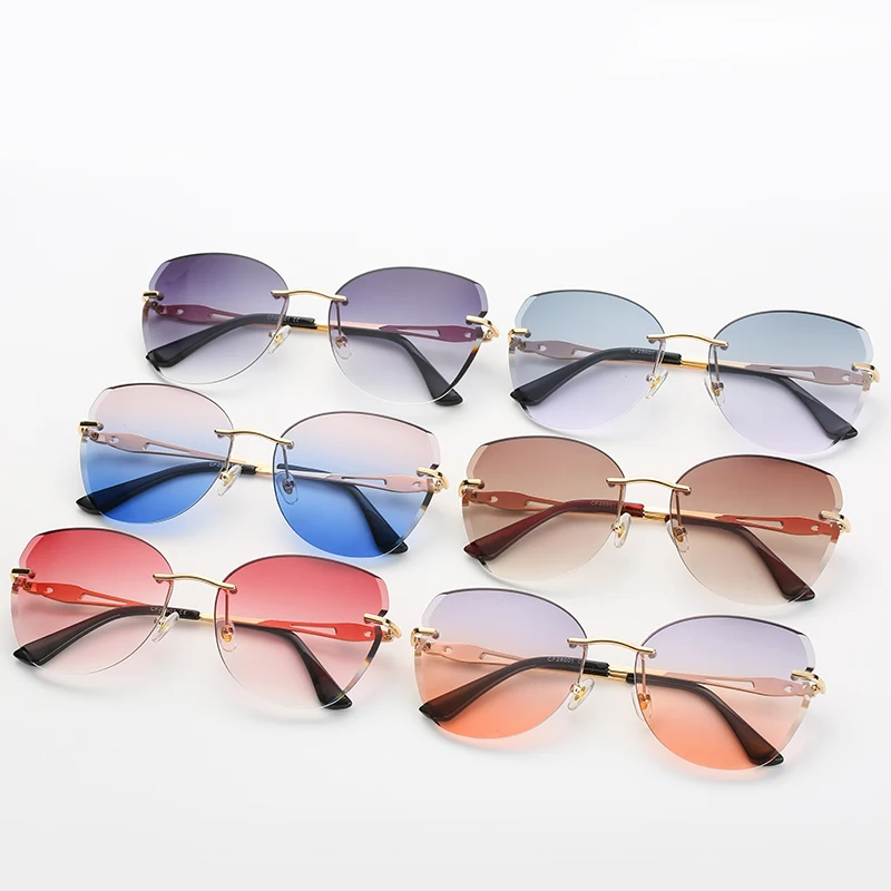 

Luxury Cat Eye Rimless Sun Glasses River Gafas de Sol Mujer Metal Big Frame Sunglasses 2021 Retro Occhiali da Sole for Women, Custom colors