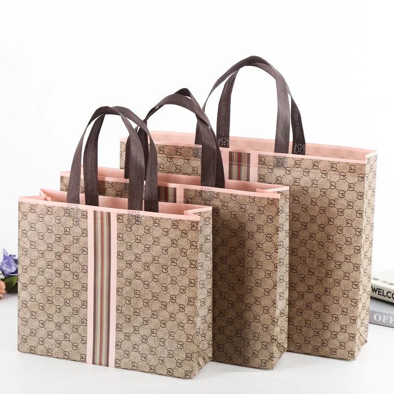 

Top Quality Free sample customized eco-friendly printed folding recyclable pp woven laminated shopping tote bag, Pink