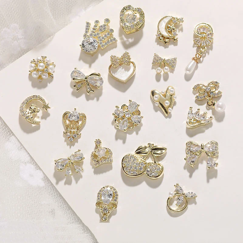 

Luxury Zircon Nail Pendant Jewelry 3D Nail Art Decorations Shiny Pearl Diamonds Heart Moon Cherry Bow Tie Crystal Alloy Charms