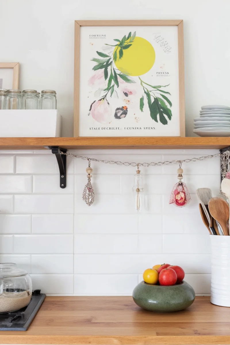 Floating wood shelves installed above a kitchen counter