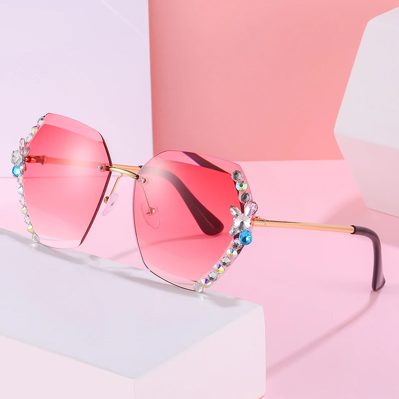 

Hot Sale Vintage Rimless Sunglasses for Woman Fashion Rhinestone Shades Custom Logo UV400