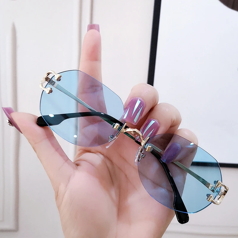 

2021 new oval women's Sunglasses small frame frameless cut edge Sunglasses retro Chaoren Street Sunglasses