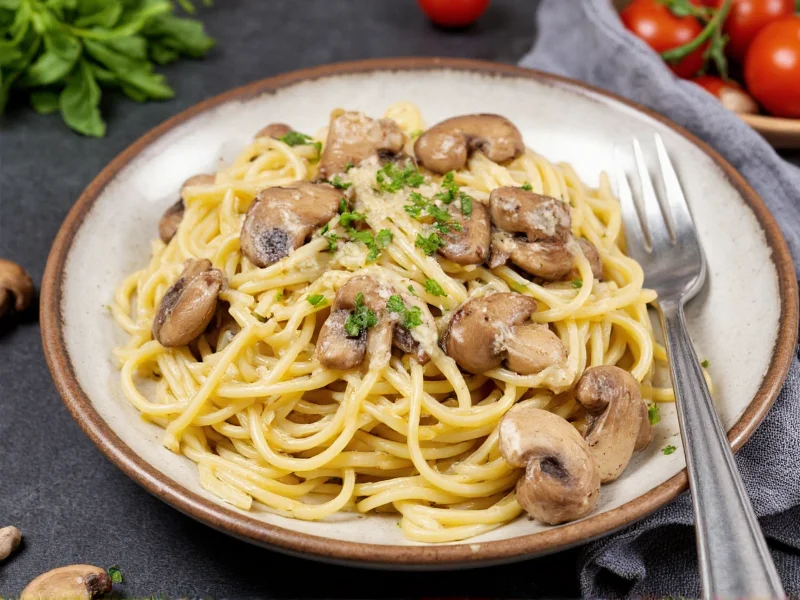 Alfredo pasta with sautéed mushrooms and fresh herbs