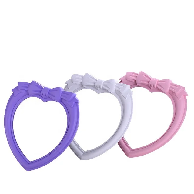 

Plastic Heart Shape Mirror Personalized Custom LOGO Bowknot Desktop Wall Makeup Mirror Cosmetic