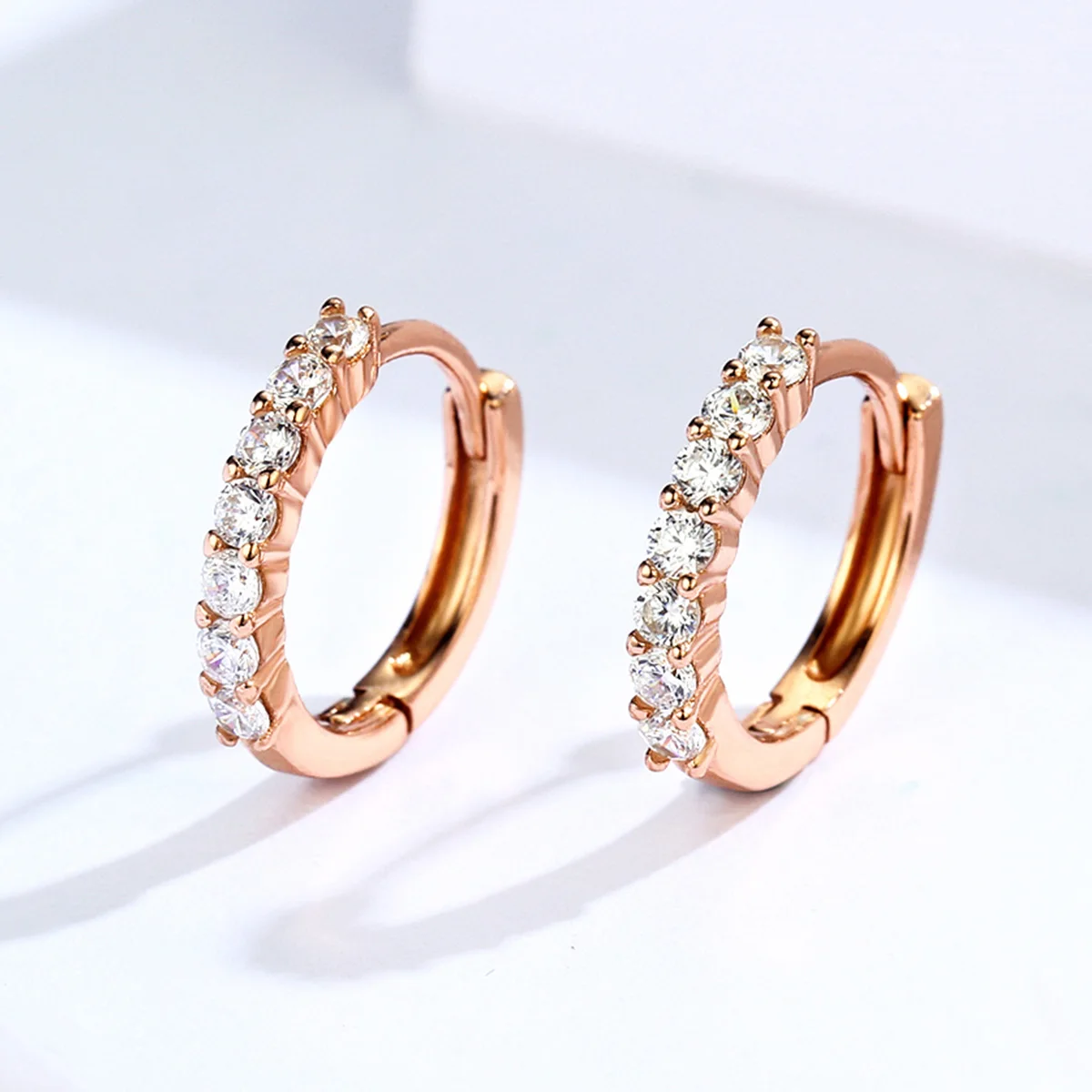 

Beautiful gemstone rose gold color silver hoop earring