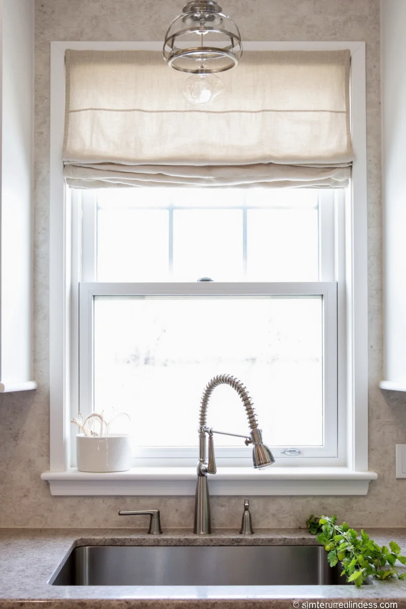 Chalkboard frame around kitchen sink window