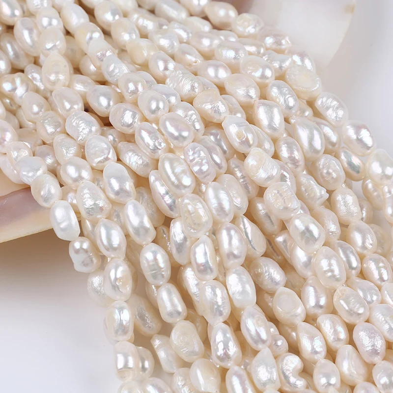 

Wholesale Natural  A/AA/3A Quality White Cultured Baroque Freshwater Pearl Strand
