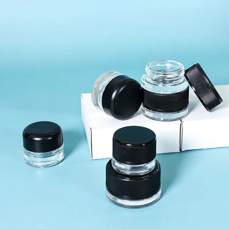 

UKETA wholesale odorless childproof portable 3ml 5ml mini weed glass storage jar with black lid