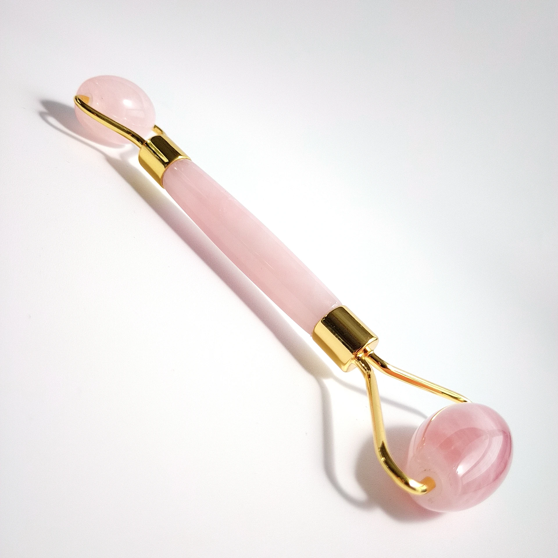 

Wholesale Rose Quartz Jade Roller Facial Eyes Skin Anti-Aging Vibration Massager