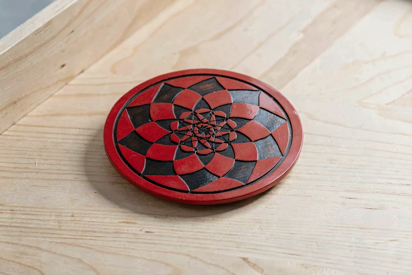 Tournament-grade striker carrom