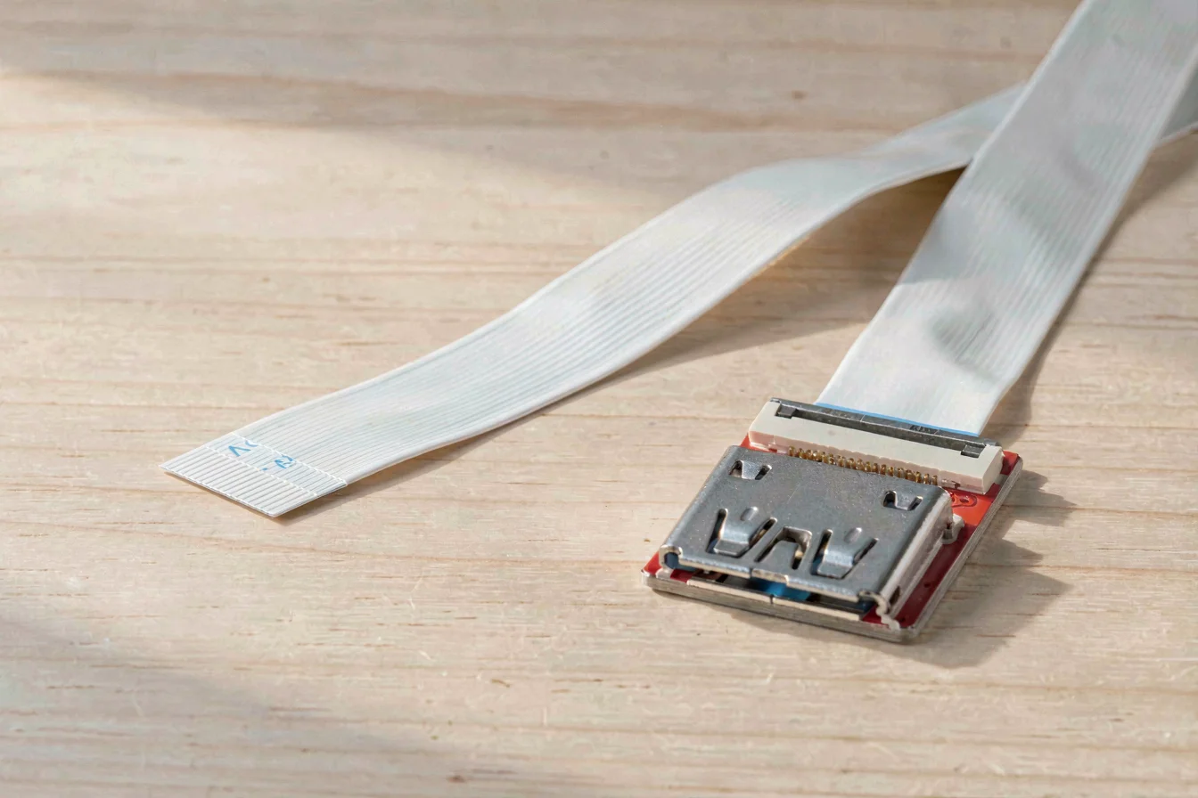 High-volume flat ribbon cable connector