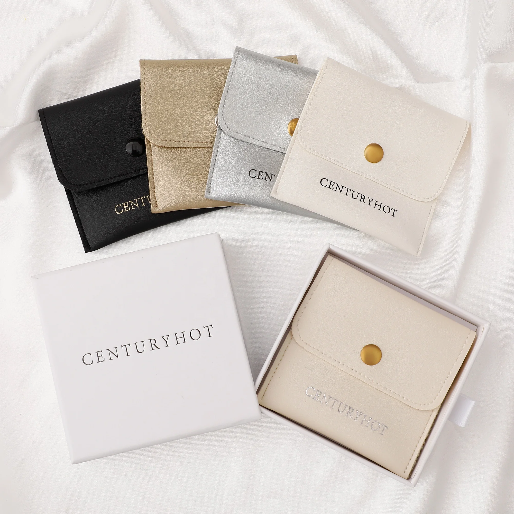 PUPPYSEW Wholesale White PU Leather Jewelry Pouch Bag  Jewelry Packaging Bag With Sanp Button Necklacering Pouch  With logo