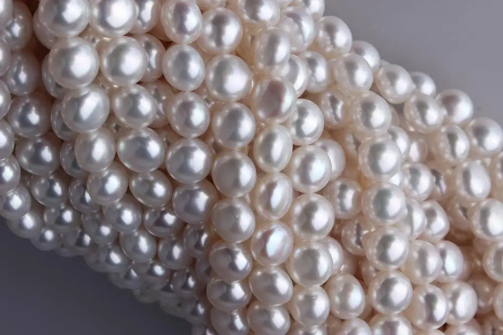 
7-7.5mm Fat Rice Shape White Colour Natural Freshwater Loose Pearl Strand, 16