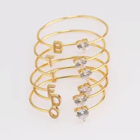 

gold plated bangle letter initial charm bracelet