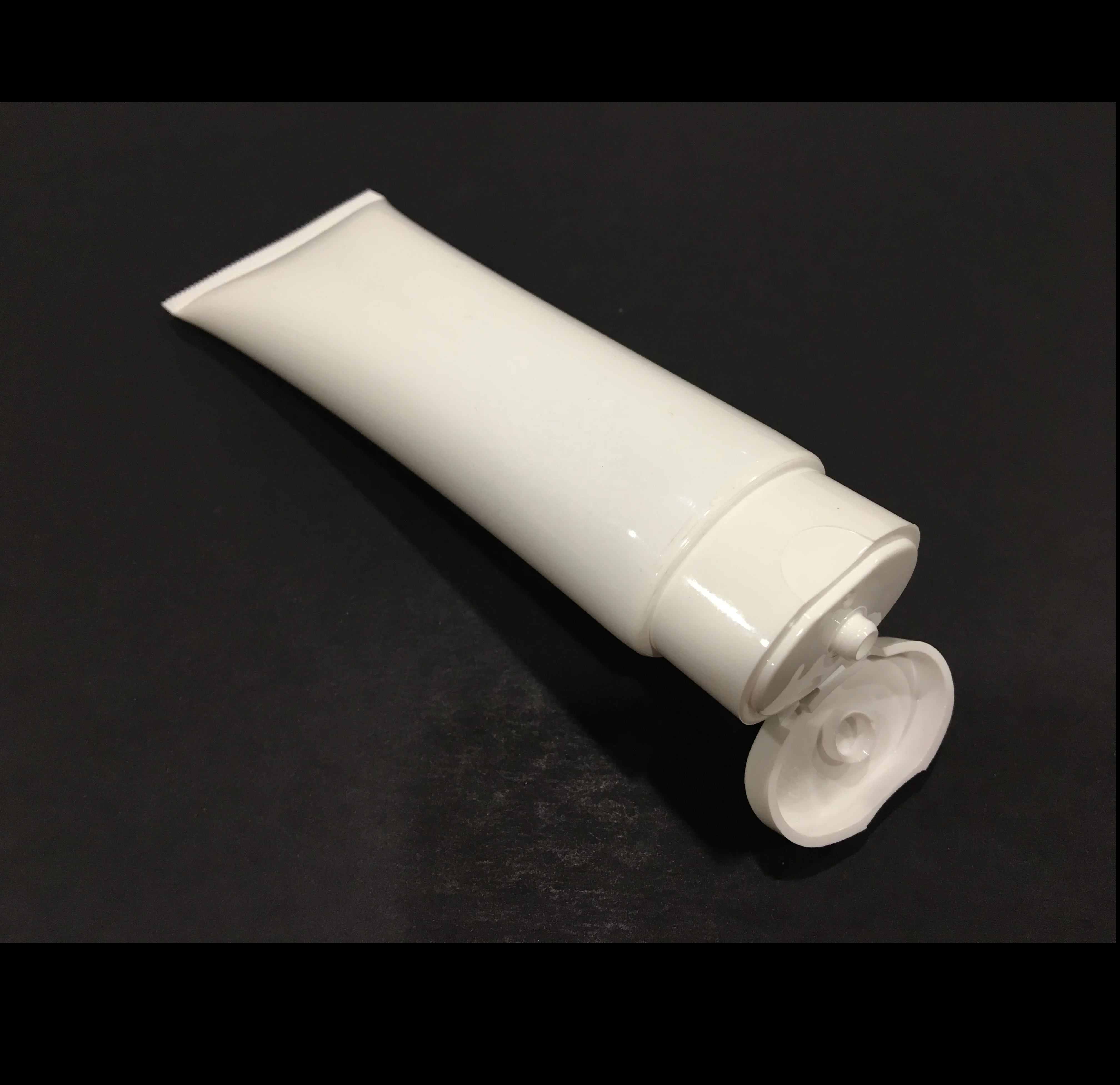 
50 ml Oval lotion tube with Flip top cap in white color 