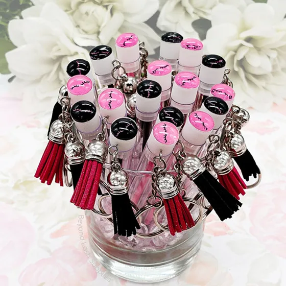 

Wholesale OEM lash spoolie unique eyelash brush empty mascara tubes with brush keychain