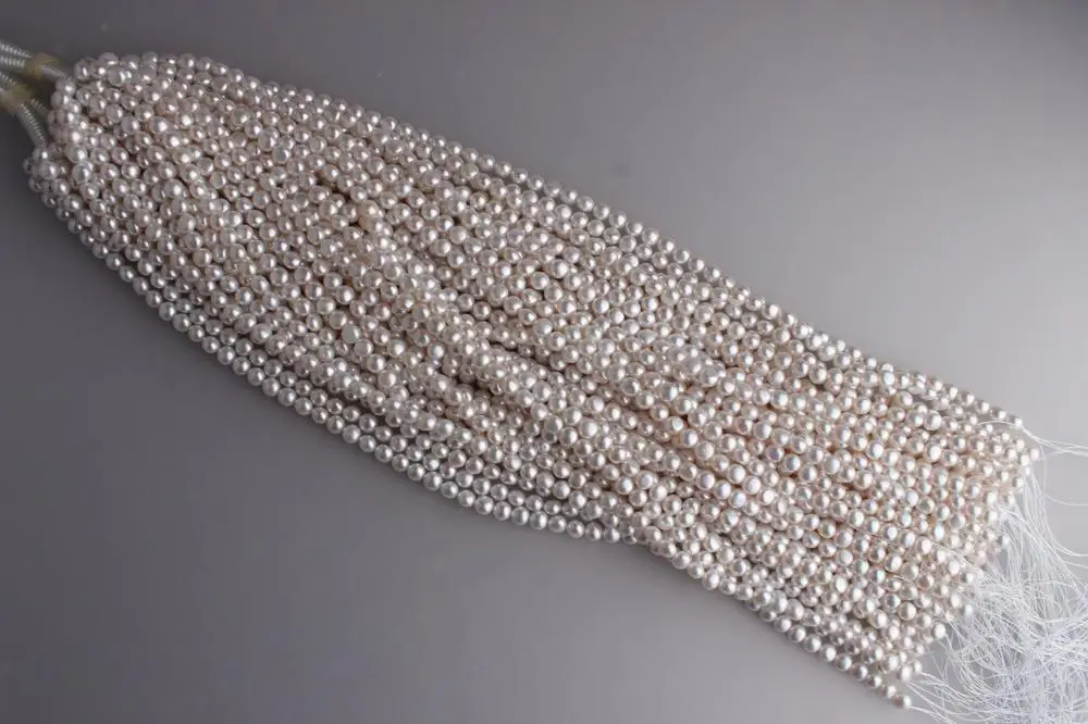 
7-7.5mm Fat Rice Shape White Colour Natural Freshwater Loose Pearl Strand, 16