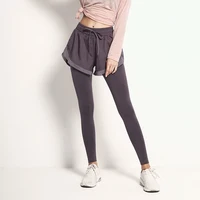 

lady dress pants yoga pants faked two pieces leggings woman running sport pants