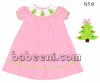 Adorable hand smocked bishop dress for Christmas with X-mas tree hand smocked patterns
