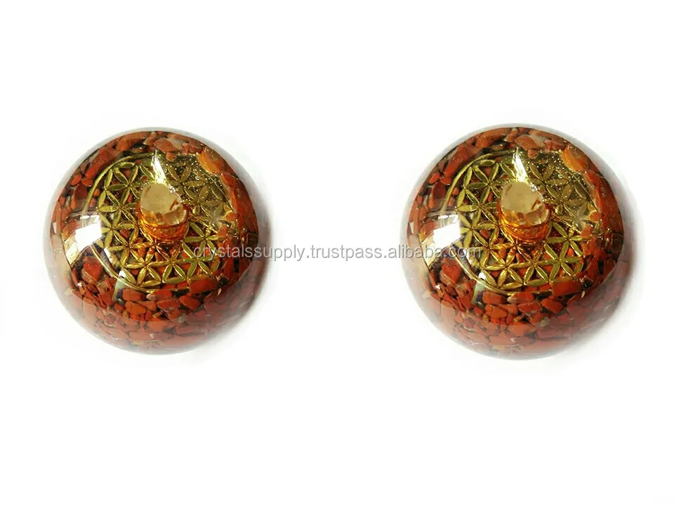 orgone spheres-ball red jasper with crystal point and flower of life.jpg
