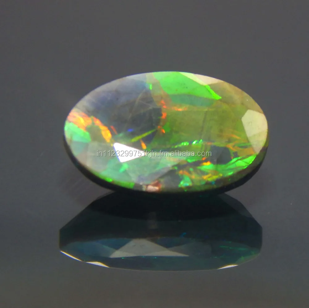 natural color play and fire faceted gemstone natural Ethiopian black opal gemstone