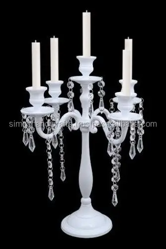 white candle holders wedding centerpieces