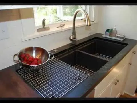 image of stainless steel kitchen sinks with drainboards. double image of stainless steel kitchen sinks with drainboards. double