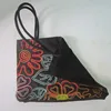 Beautiful Silk handbag with flower detail made from beads