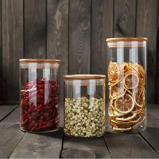 Cheap food container glass storage jars with wooden lids for sale.jpg