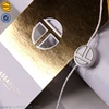 Custom Design Gold Foil with Plastic Seal String for Clothing Tag