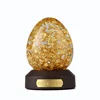 /product-detail/gold-flakes-custom-resin-egg-shape-snow-globe-decor-62003146705.html