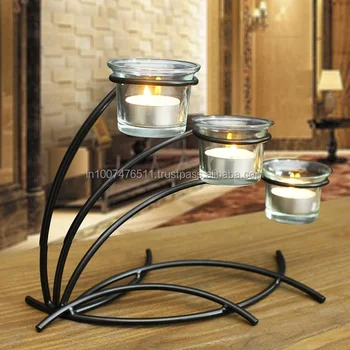 glass and iron candle holders