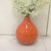 Beatiful orange round spun bamboo vase, small glosbe vase