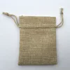 Jute Pouch bag with PP window on floor for sale.