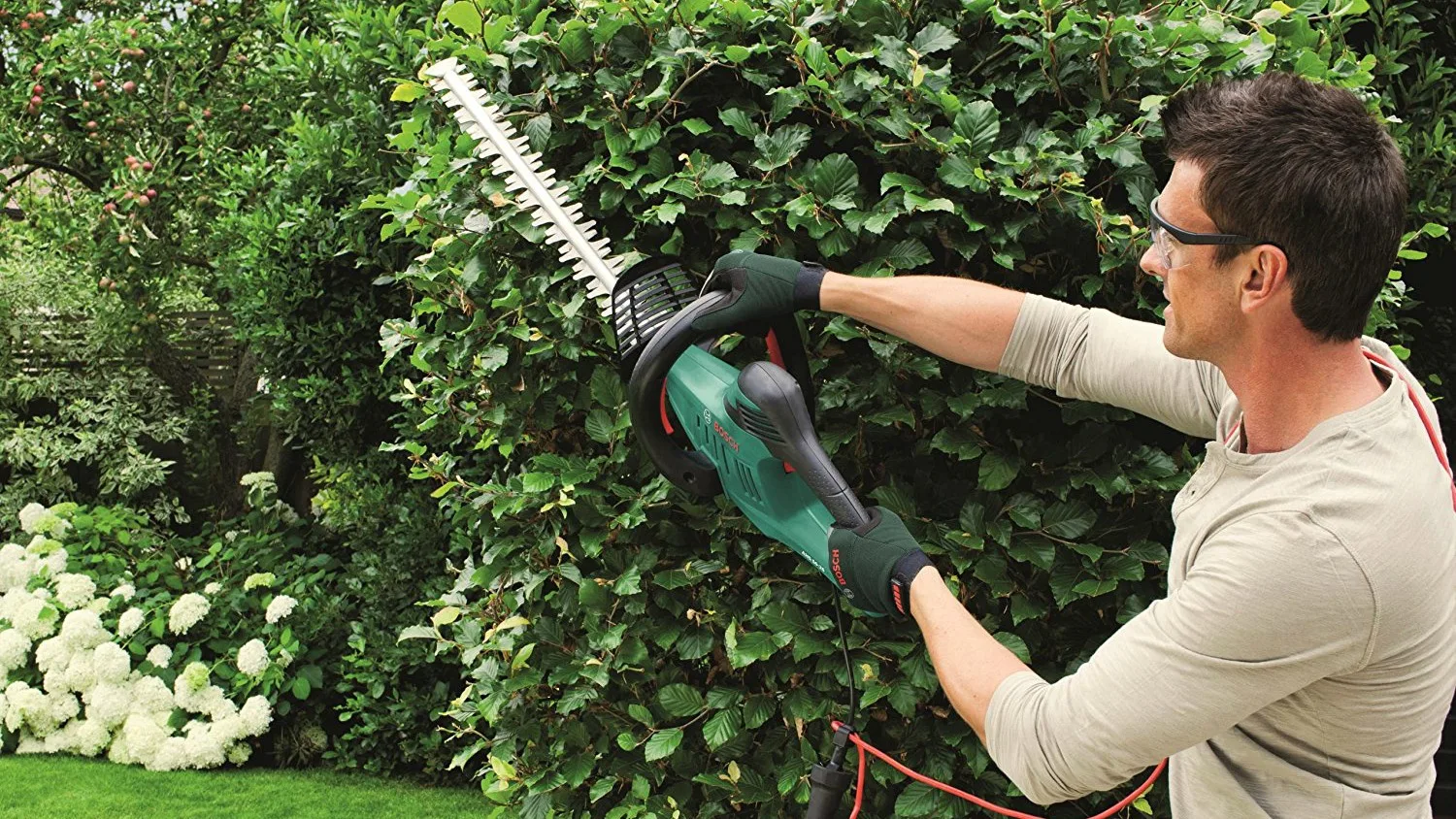 handheld electric hedge trimmer